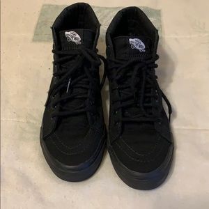 All black high top VANS